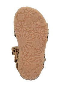 Hellbrauner Schuhsohle mit Blumen- und Sonnenstrahlenmustern. Texturiertes Gummimaterial, flaches Design, mit einer Schnalle und einem oberen Teil mit Punkten.
