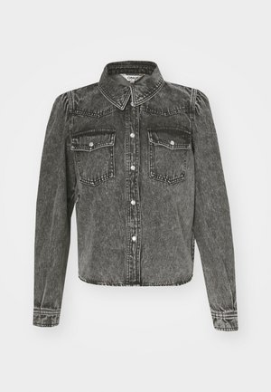 Black denim jacket with a collared neck, front pockets, and button closure. Features a cropped design and visible stitching details.