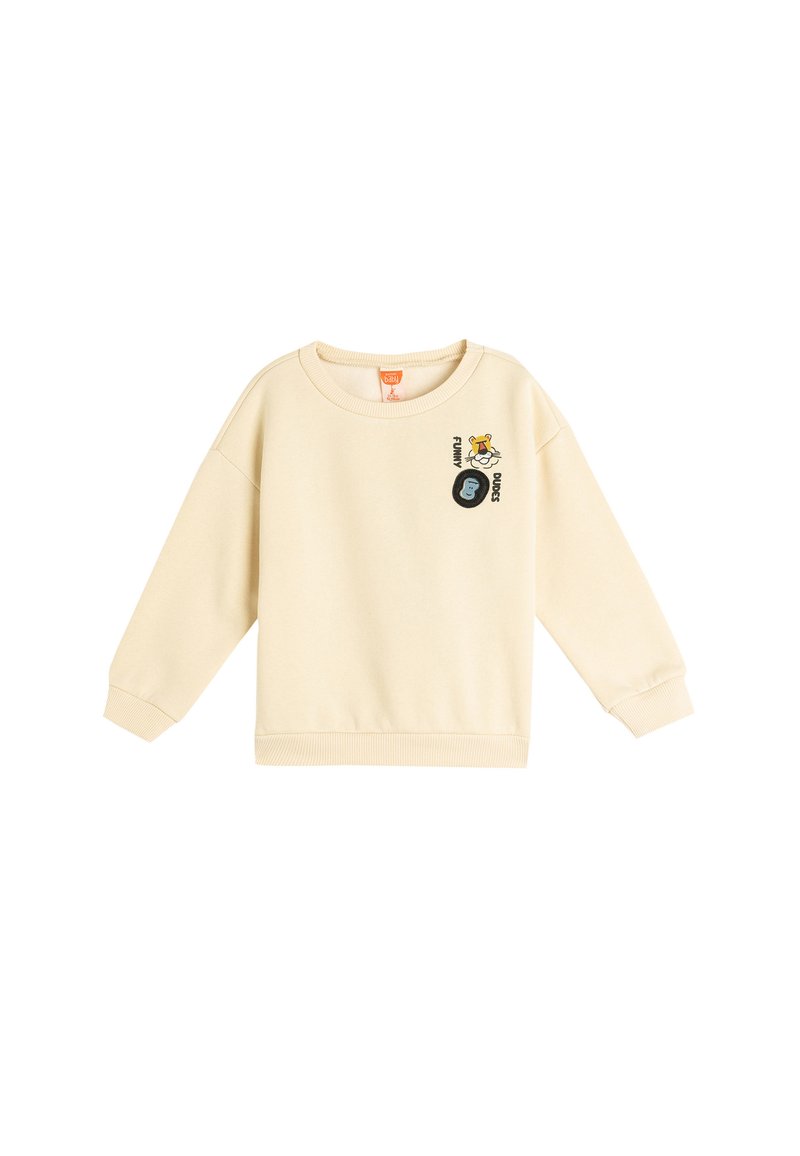 Lichtbeige sweatshirt met een ronde hals, lange mouwen, ribbelmanchetten en geborduurde cartoonaccenten op de voorkant. Soepele textuur.