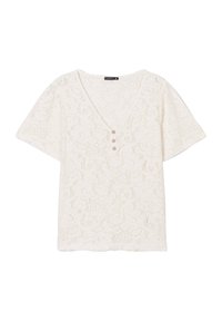 Top in pizzo bianco con scollatura a V, maniche corte e tre bottoni decorativi sul davanti. Presenta un motivo floreale su tutta la superficie.