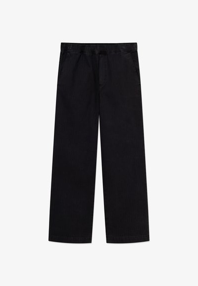 Pantalon large noir à taille élastique, avec deux poches latérales et une texture lisse, fabriqué en tissu mélange de coton durable.