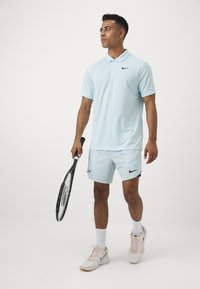 Nike Performance SOLID - Poloskjorter - glacier blue/black