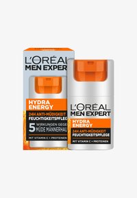 L'Oréal Men Expert Hydra Energy moisturizer in a silver bottle with an orange cap. Packaging features bold black and orange text.
