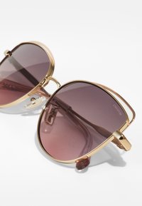 COACH Päikeseprillid - shiny light gold-coloured/rose gold-coloured/grey pink