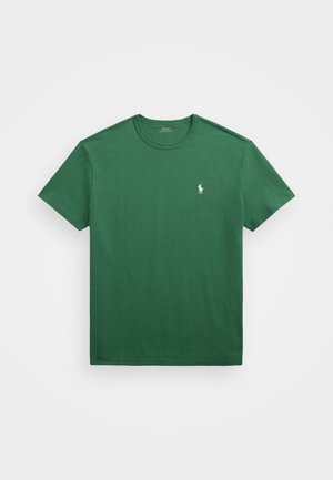 T-shirt verde a maniche corte con scollo rotondo e piccolo logo Polo Ralph Lauren bianco ricamato sul petto a sinistra.