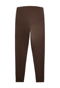 Bruna leggings gjorda av elastiskt tyg, med en hög midja, mjuk yta och en åtsittande silhuett med en enkel design.