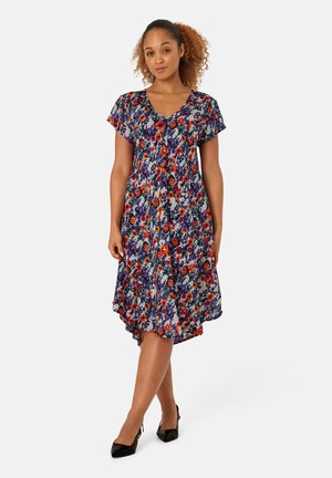 Floral dress with short sleeves, V-neck, multicolored print featuring red, purple, and orange flowers on a light background, and an asymmetrical hem.