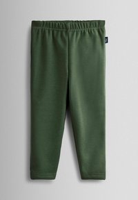 Zöld, könnyű, elasztikus leggings, rugalmas derékkal. Sima textúrájú, látható minták vagy fémszerelvények nélkül.