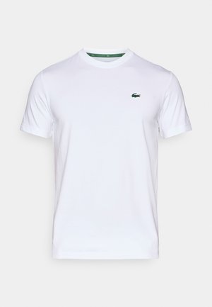 Weißes kurzärmliges T-Shirt mit Rundhalsausschnitt und kleinem grünen Krokodil-Logo auf der linken Brust.