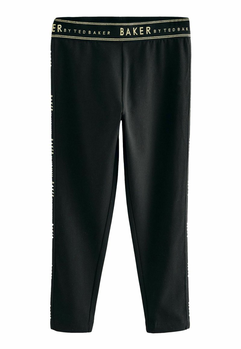 Zwarte leggings met een gladde textuur, met gouden letters op de tailleband en zijkanten. Slank model met taps toelopende pijpen.