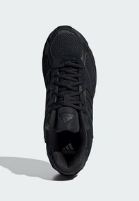 Black athletic shoe featuring a mesh upper, suede accents, round laces, three stripe design, and a textured rubber outsole.