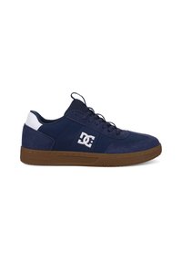 Navy blue sneaker made of suede and mesh, featuring a white heel accent and a rubber gum sole. Includes laces and logo detail on the side.