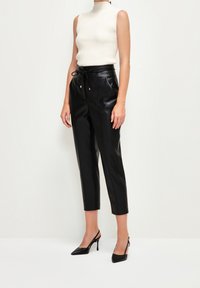 adL Tygbyxor - black