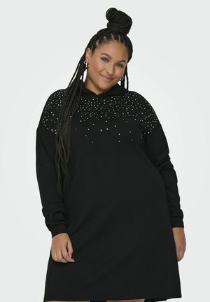 Abito felpa nero con cappuccio, decorato con strass argentati nella parte superiore. Tessuto morbido, maniche lunghe, vestibilità comoda.
