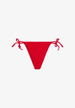 Red ribbed bikini bottom with tied side strings, laid flat on white background.