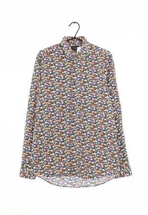 Camicia a maniche lunghe con una base scura, caratterizzata da un motivo floreale multicolore. Realizzata in tessuto leggero, con colletto classico e orlo curvo.