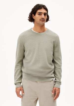 Hellgrüner, strukturiert Sweatshirt mit Rundhalsausschnitt, gerippten Bündchen und Saum. Hergestellt aus einem weichen Material mit einem dezenten Karomuster.