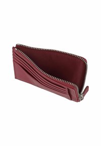 Berry-colored leather wallet with multiple card slots, zip closure, and a smooth texture. Interior lining is a contrasting fabric.