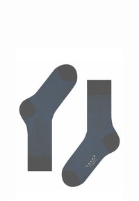 Blaue Socken mit strukturiertem Design, mit dunkelgrauen Akzenten an Ferse und Zehen. Logo seitlich aufgedruckt.