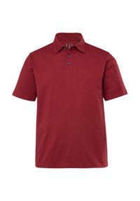 Červená polokošile s krátkým rukávem vyrobená z bavlny, s límečkem na knoflíky a rovnými lemy. Jednoduchý design bez vzorů nebo akcentů.