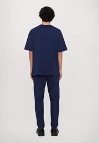 Versace Jeans Couture Triko s potiskem - blu