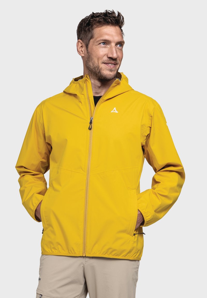 Gelbe wasserdichte Jacke mit durchgehendem Reißverschluss, verstellbarem Kapuzen und elastischen Bündchen. Verfügt über ein Logo auf der linken Brust und seitliche Taschen.