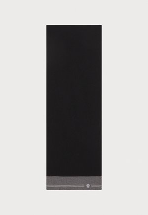 Prosop negru cu un accent subtil de gri la bază. Textură netedă cu un design simplu, având dimensiuni aproximativ rectangulare.