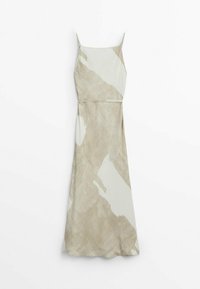 Robe à bretelles spaghetti dans une couleur beige clair avec des motifs crémeux abstraits ; tissu fluide et silhouette en A, avec une taille ajustée.