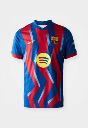 Barselonas futbola krekls sarkanā un zilā krāsā, ar zigzaga rakstiem, apģērba apkakli un dzelteno Spotify logo. Redzama Nike zīmola identifikācija.