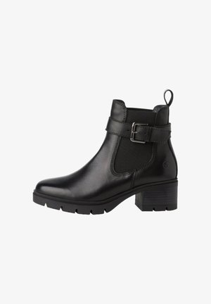 Black leather ankle boot with elastic side panels, buckle detail, textured finish, and a chunky heel. Features a pull tab on the heel.