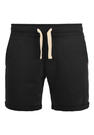 Shorts décontractés noirs avec ourlets retroussés et cordon beige sur taille élastique, poches avant, et une petite étiquette latérale.