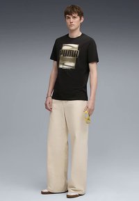 Puma Tričko s potlačou - black