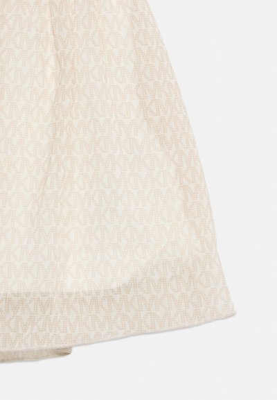 Μπεζ ύφασμα με επαναλαμβανόμενο μοτίβο ανοιχτό καφέ «MK» και ορατή ραφή κατά μήκος του τελειώματος.