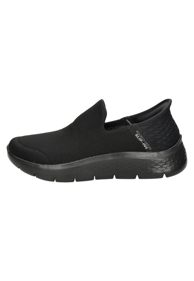 Sneaker neri senza lacci realizzati in mesh, con una tomaia testurizzata, suola ammortizzata e un design liscio e elegante.