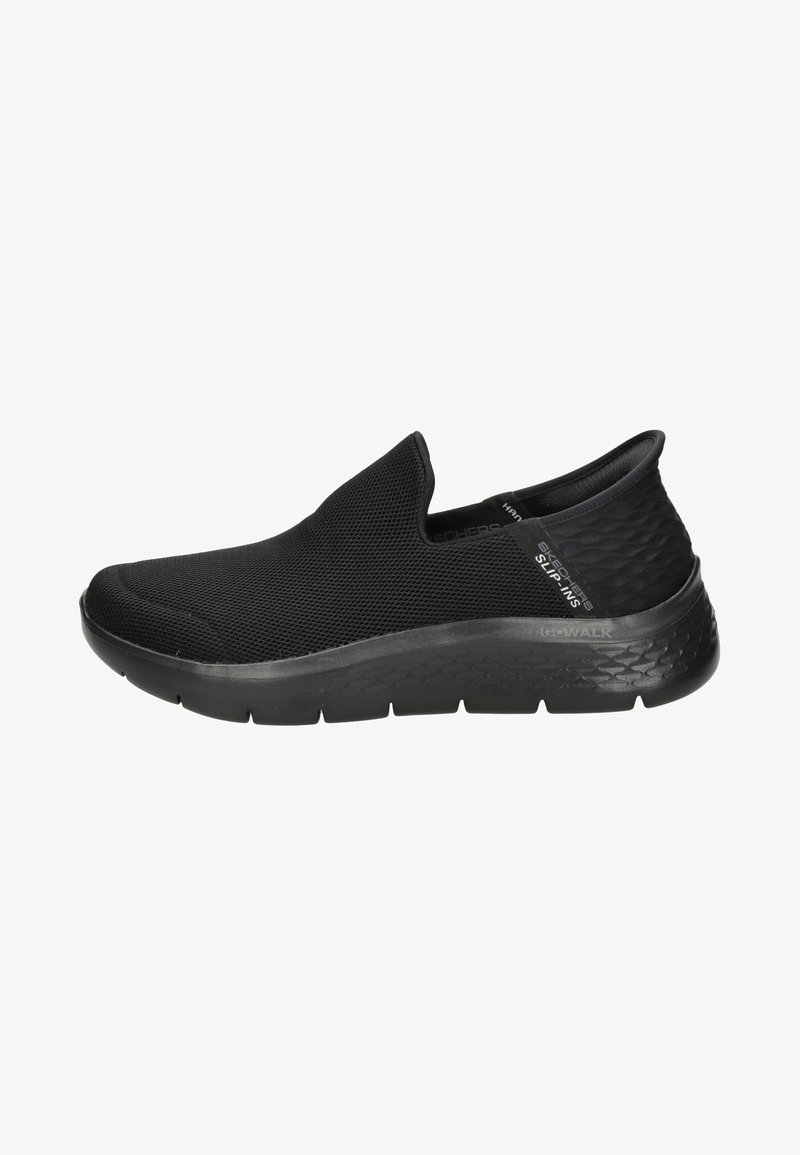 Schwarze Slip-On-Sneaker aus Mesh-Material mit einem strukturierten Obermaterial, gepolsterter Sohle und einem glatten, eleganten Design.