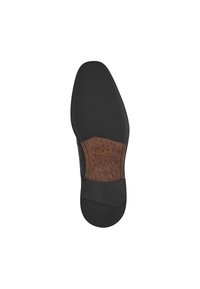 Czarna podeszwa buta z teksturowanej gumy, z brązowym wytłoczonym wkładem oznaczonym napisem "Tamaris" oraz rozmiarem "42".