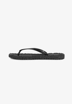 Black flip-flop with a textured woven sole, flat design, and glossy plastic straps. Simple and functional construction.