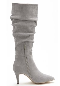 Gray suede knee-high boot with pointed toe, slouchy design, and a side zipper for easy wear; features a slim, tapered heel.
