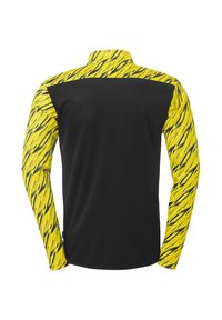 Langsleeve shirt met een gedurfde geel-zwarte gestreepte patroon op de mouwen, met een effen zwarte achterkant en een hoge kraag.