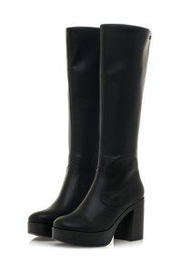 Bottes noires en cuir synthétique montantes jusqu'au genou, avec un talon épais, une texture lisse et un détail de fermeture éclair sur le côté.