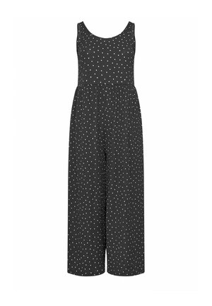 Zwarte mouwloze jumpsuit met wijde pijpen en witte polkadotversiering gelijkmatig verdeeld over de stof.