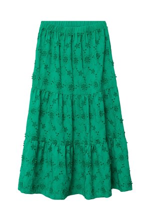 Jupe verte à volants avec ceinture élastique, ornée de motifs floraux brodés et de petites appliques de fleurs en tissu.