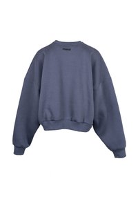 Tumedat sinise värvi ülerõivaste särk, mis on valmistatud puuvilla segakanga, omades ümmargust kaelaauku, langevaid õlgu ja soonikuid varrukate ning alläärte juures.