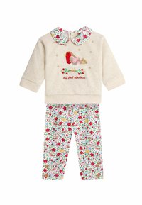 Sweatshirt din bumbac bej deschis, cu broderie în formă de pasăre roșie și guler floral, asortat cu colanți albi cu un model colorat de sărbători.