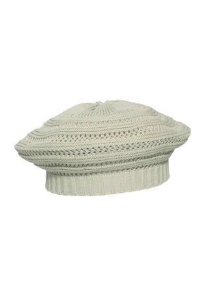 Cream-colored knitted beret with ribbed band and patterned stitch details, showing textured knit design and round, flat shape.