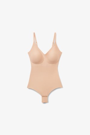 Body beige sin costuras con copas de sujetador integradas, tirantes finos ajustables y cierres de presión en la entrepierna.