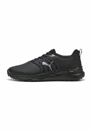 Black athletic shoes featuring a textured mesh upper, synthetic overlays, and a durable rubber sole with traction patterns.