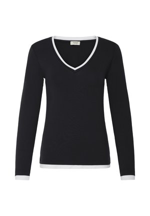 Zwarte lange mouwen V-hals top met witte rand bij de halslijn, mouwboorden en zoom, weergegeven op een effen witte achtergrond.