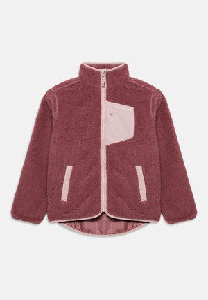 Ζακέτα fleece με μακριά μανίκια σε αποχρώσεις ροζ σκόνης, με απαλό ροζ φερμουάρ, τσέπη στο στήθος και πλαϊνές τσέπες, ψηλό γιακά και υφασμάτινη υφή.