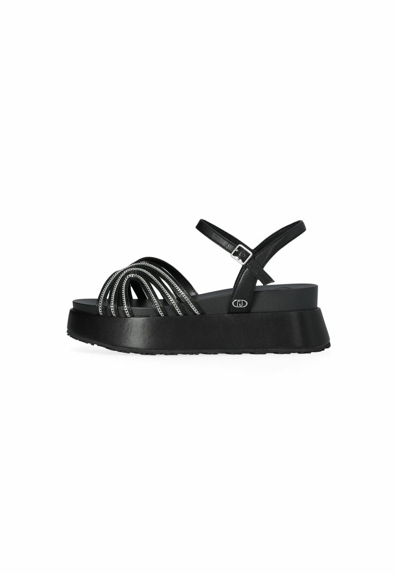 Sandales plateformes noires avec plusieurs brides entrecroisées, dessus texturé, sangle de cheville réglable et semelle épaisse pour la stabilité.